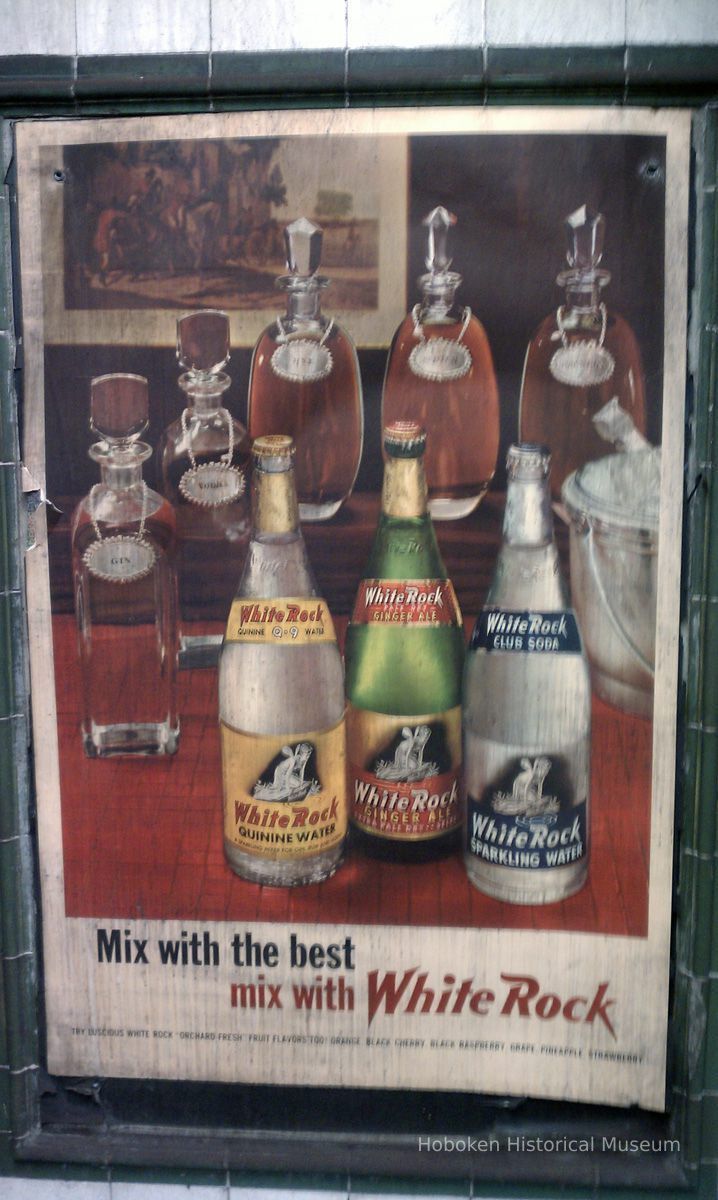 Ad poster, White Rock soda beverages, uncovered at PATH station, Hoboken