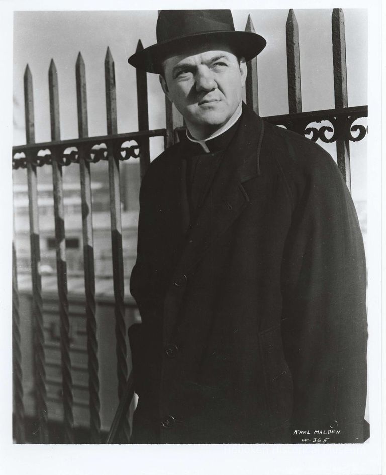 Black-and-white publicity photo of Karl Malden as Father Barry in film 