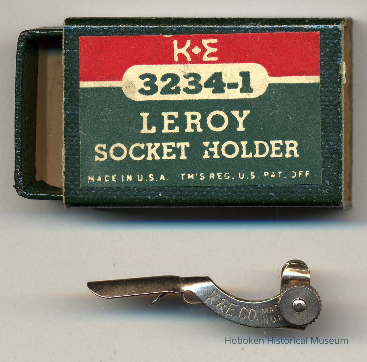 box and contents: metal holder