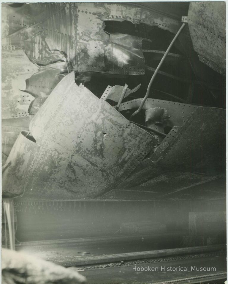 B+W photo of exterior view of damaged hull plates on unidentified vessel at the Bethlehem Steel Shipyard, Hoboken Division, no date, ca. 19 picture number 1