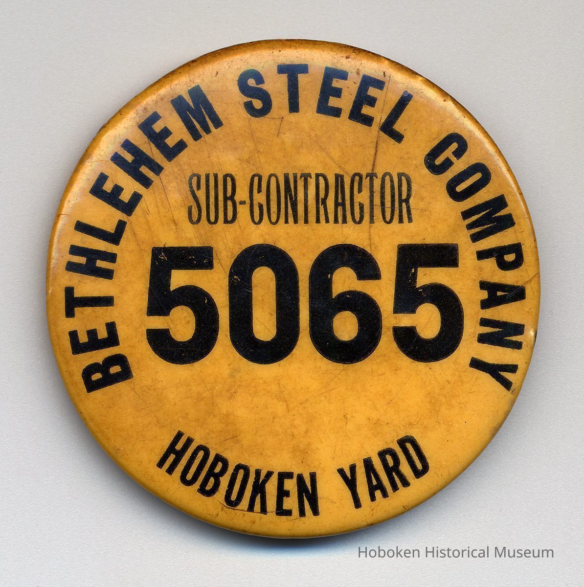 Employee badge: Bethlehem Steel Company, Hoboken Yard, Sub-Contactor 5065. N.d., ca. 1950-1980. picture number 1