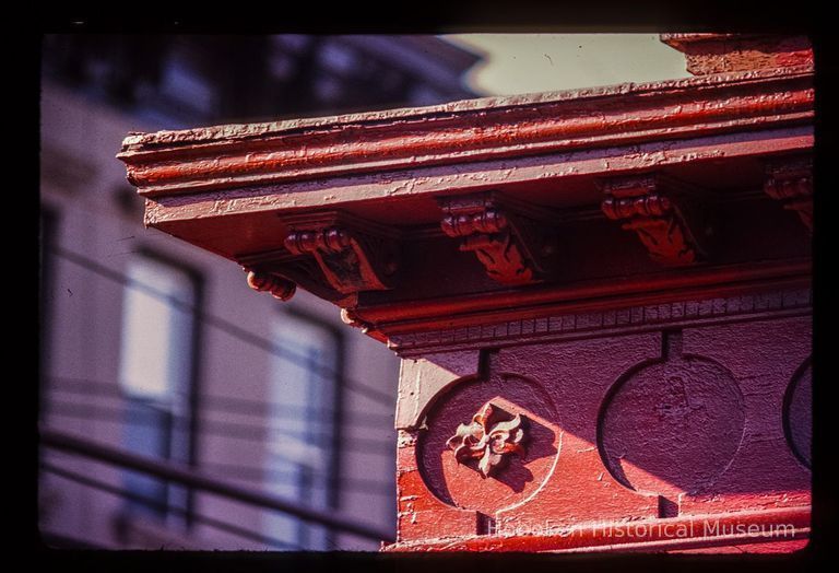 Color slide of detail view of storefront cornice and frieze at 1001 Bloomfield picture number 1