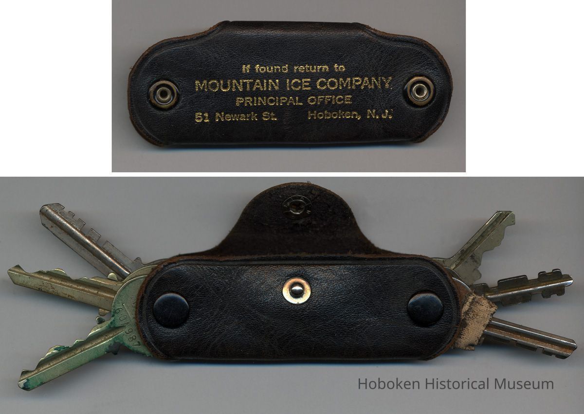 top: front view with lettering; bottom: back, opened with keys outs