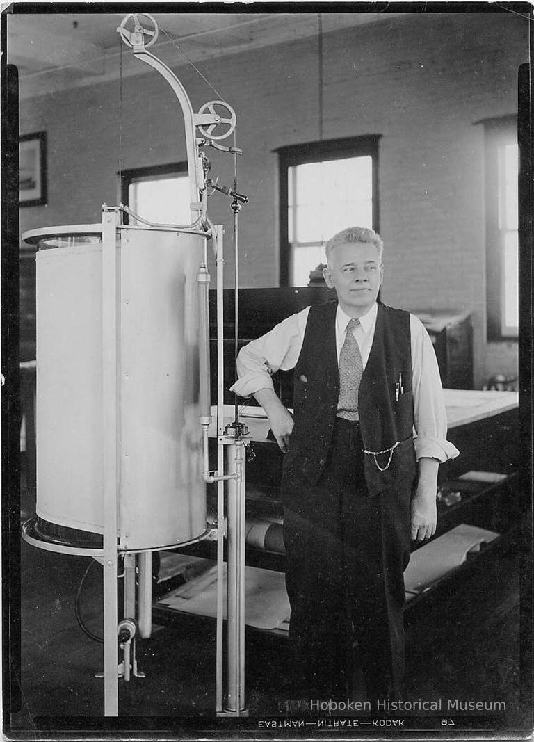 B+W photo of worker in drafting room next to drawing duplicator, United Dry Dock Co., Hoboken, 1931. picture number 1