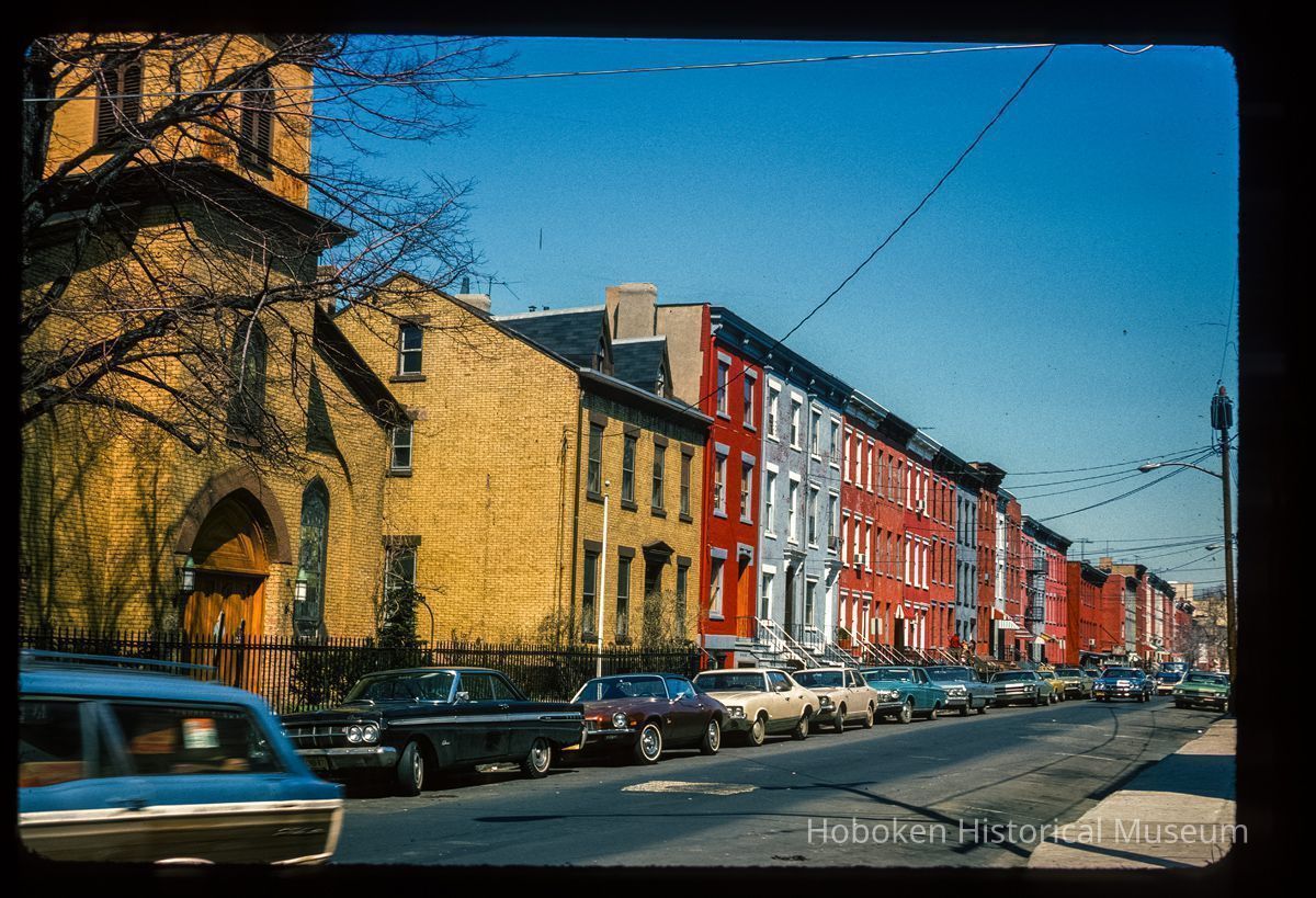 Color slide of eye-level view of row houses on the W side of Garden looking N and the Community Church of Hoboken at 600 Garden picture number 1