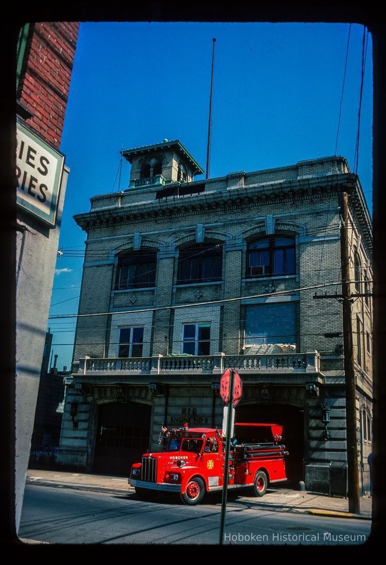 Color slide of eye-level view of the Hoboken Fire Department Engine Company No. 3 fire station façade at 201 Jefferson on the corner with 2nd picture number 1