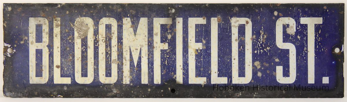 Enameled metal street sign, 