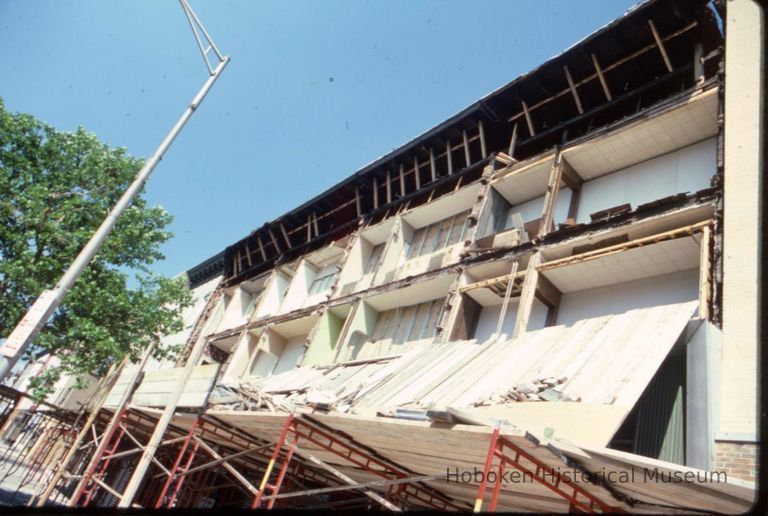 Color slide of facade replacement underway, east side of the 400 block of Washington St., Hoboken, June, 1983. picture number 1