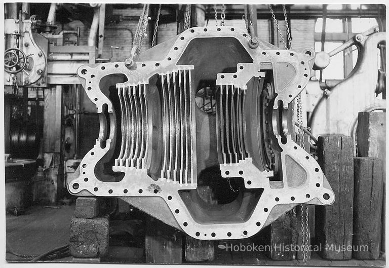 B+W photo of low pressure turbine casing, probably the top half of the S.S. Bonheur, machine shop, Hoboken, no date, [Feb., 1938.] picture number 1