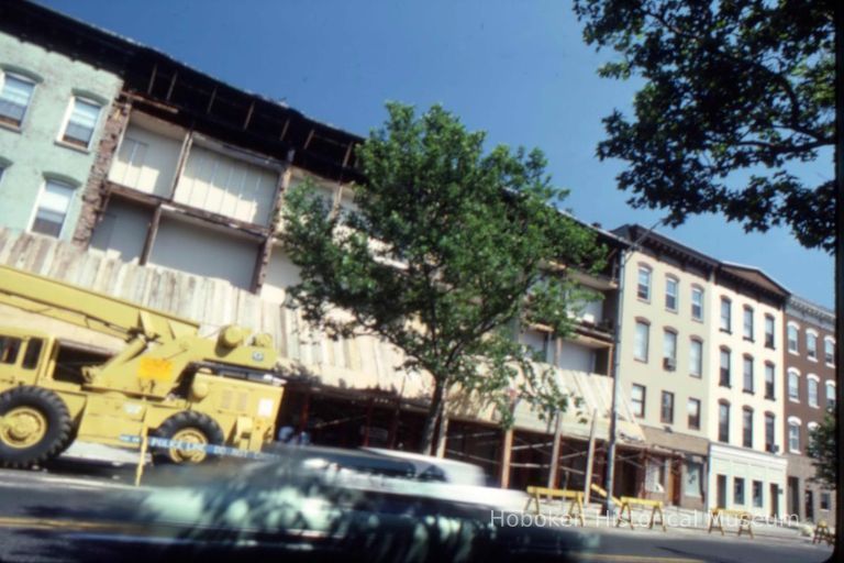 Color slide of facade replacement underway, east side of the 400 block of Washington St., Hoboken, June, 1983. picture number 1