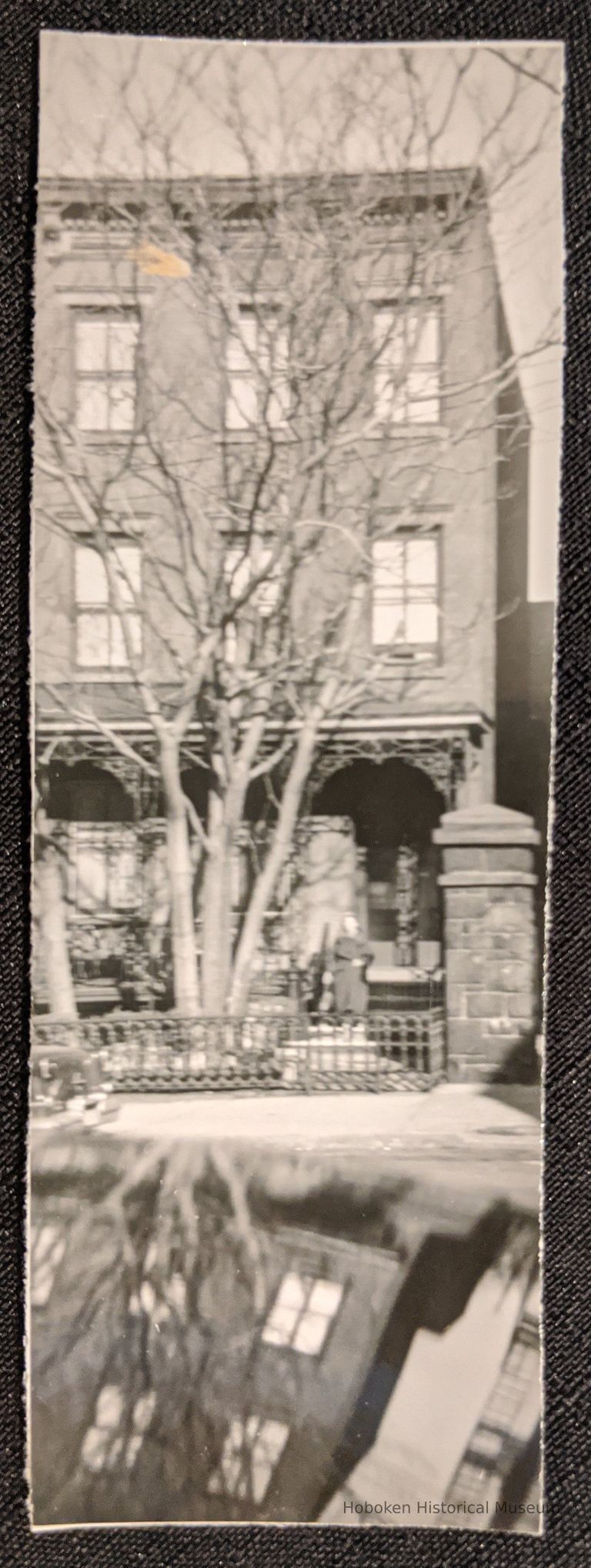 Woman in front of 64 10th Street Hoboken.