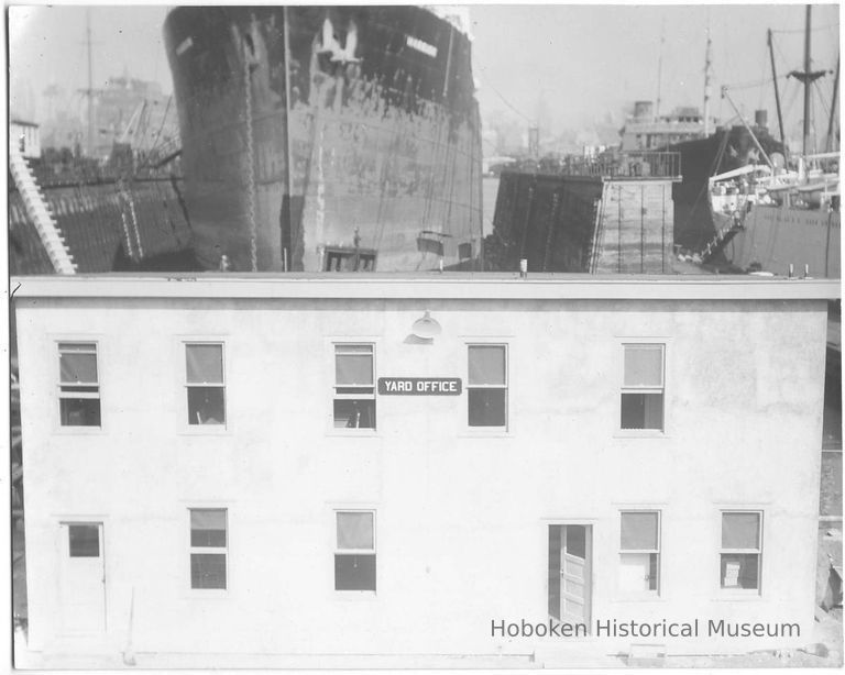 B+W photo of the Yard Office with the S.S. Warrior in a dry dock, Hoboken, no date, ca 1940. picture number 1