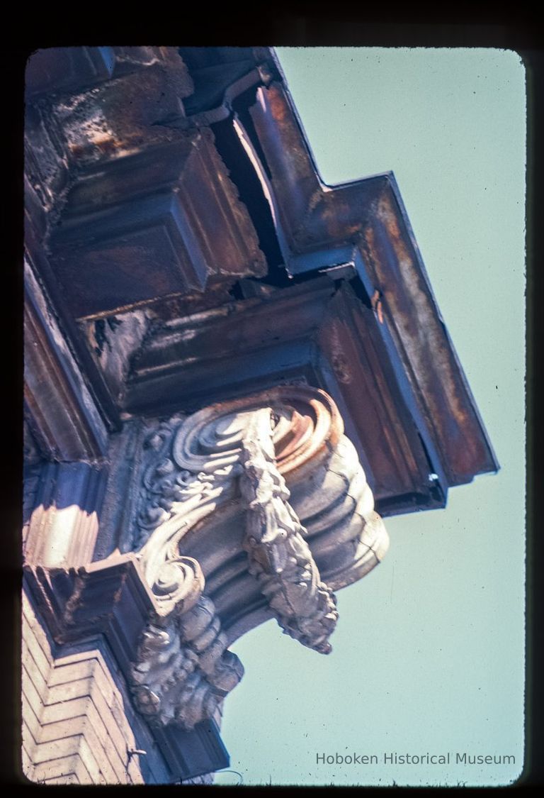 Color slide of detail view of cornice, dentil and bracket on an unidentified building on Washington between 2nd and 3rd picture number 1