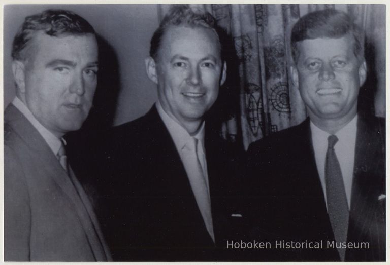 B+W photo of Presidential candidate John F. Kennedy with Congressman Neil Gallagher & County Sheriff Bill Flanagan, ca. Sept. - Oct. 1960. picture number 1