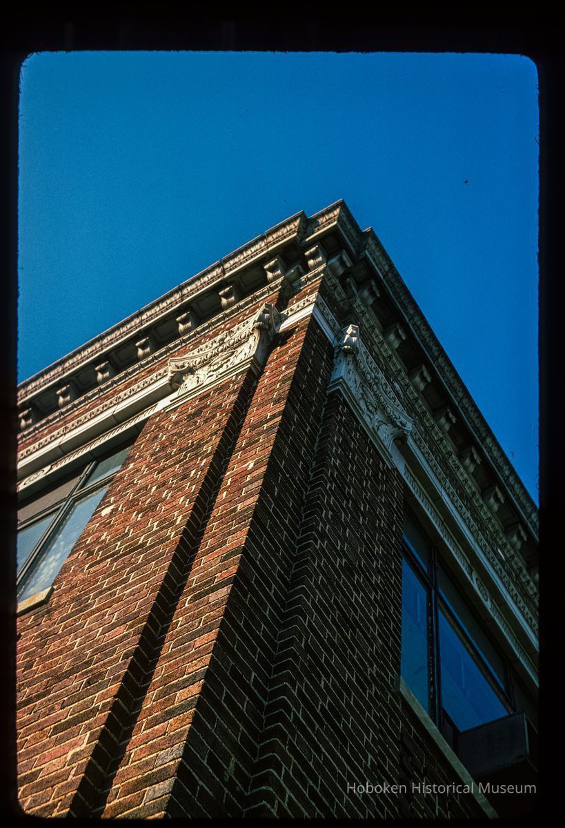 Color slide of detail view of cornice, brackets, frieze and pilasters at 86 River Street on the SW corner with Newark picture number 1