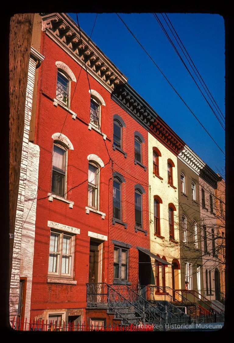 Color slide of eye-level view of row houses on an unidentified street, possibly Bloomfield picture number 1