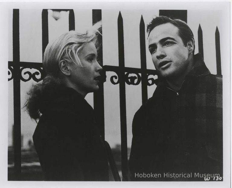 B+W publicity photo of Eva Marie Saint as Edie Doyle and Marlon Brando as Terry Malloy in film 