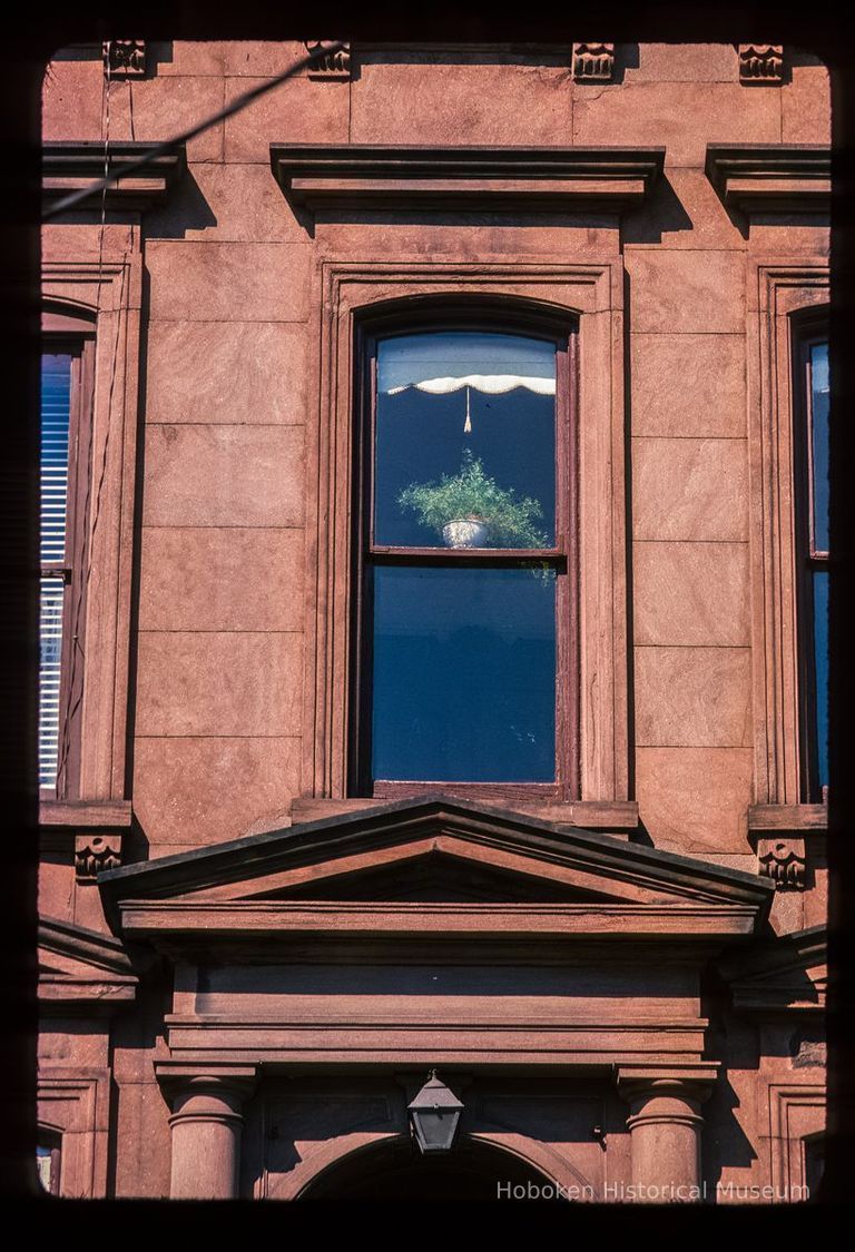 Color slide of detail view of façade, portico pediment and columns at 638 Hudson on the SW corner with 7th picture number 1