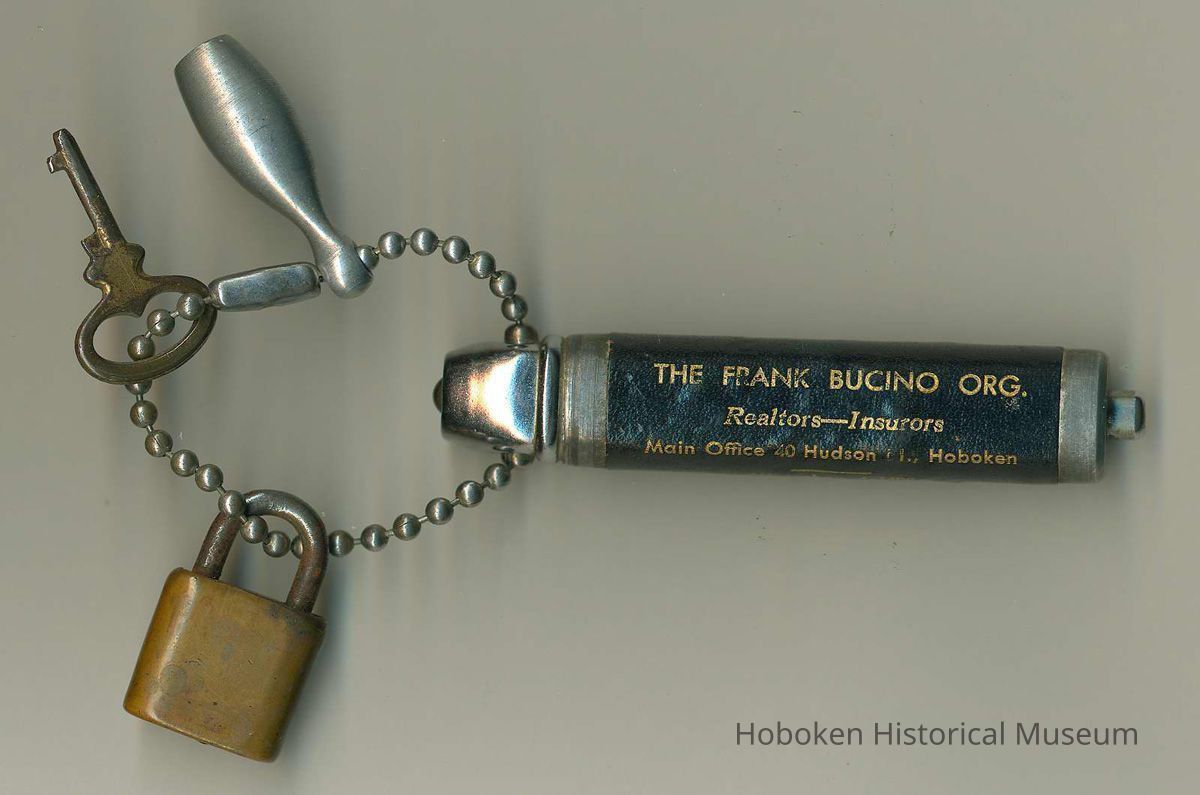 Key chain with 3 charms and promotional flashlight from The Frank Bucino Organization, Real Estate, Hoboken, no date, ca. 1950-1960. picture number 1