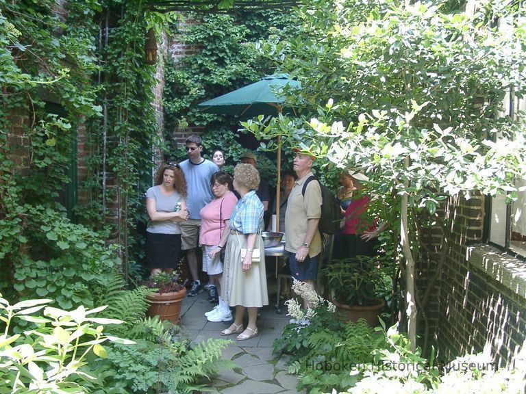 Digital color image of the gardens and people on the Secret Gardens Tour, Hoboken Historical Museum, Hoboken, June 9, 2002. picture number 1