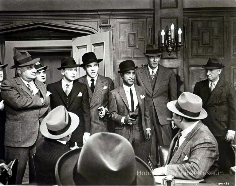 Black-and-white photo, movie still, of Sammy Davis, Jr., Frank Sinatra in 