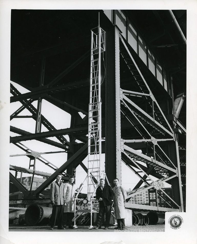 U.S. Testing: load test on extension ladder at 14th St. Viaduct