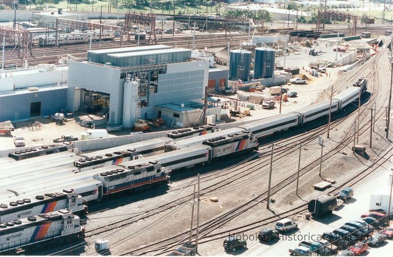 Digital image of color photo of an aerial view of New Jersey Transit passenger trains locomotives in the yard, Hoboken Terminal, Hoboken, Sept. 2002. picture number 1