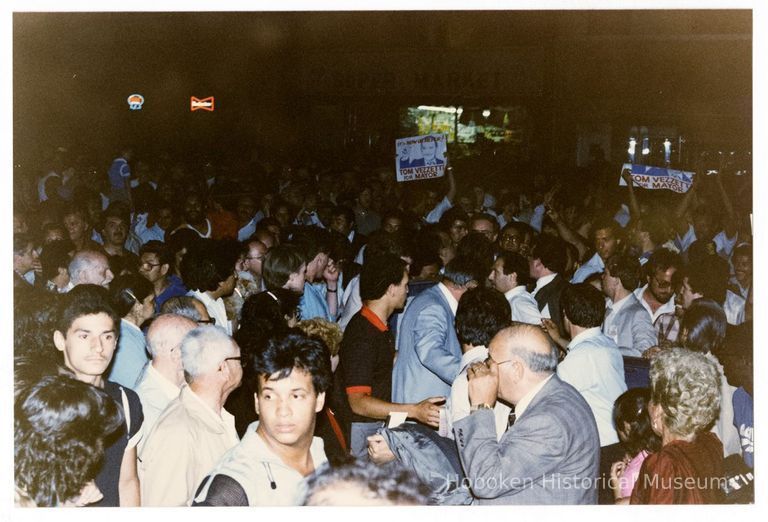 Color photo of supporters of mayoral candidate Tom Vezzetti in front of City Hall on election night, Hoboken, [June 11, 1985]. picture number 1