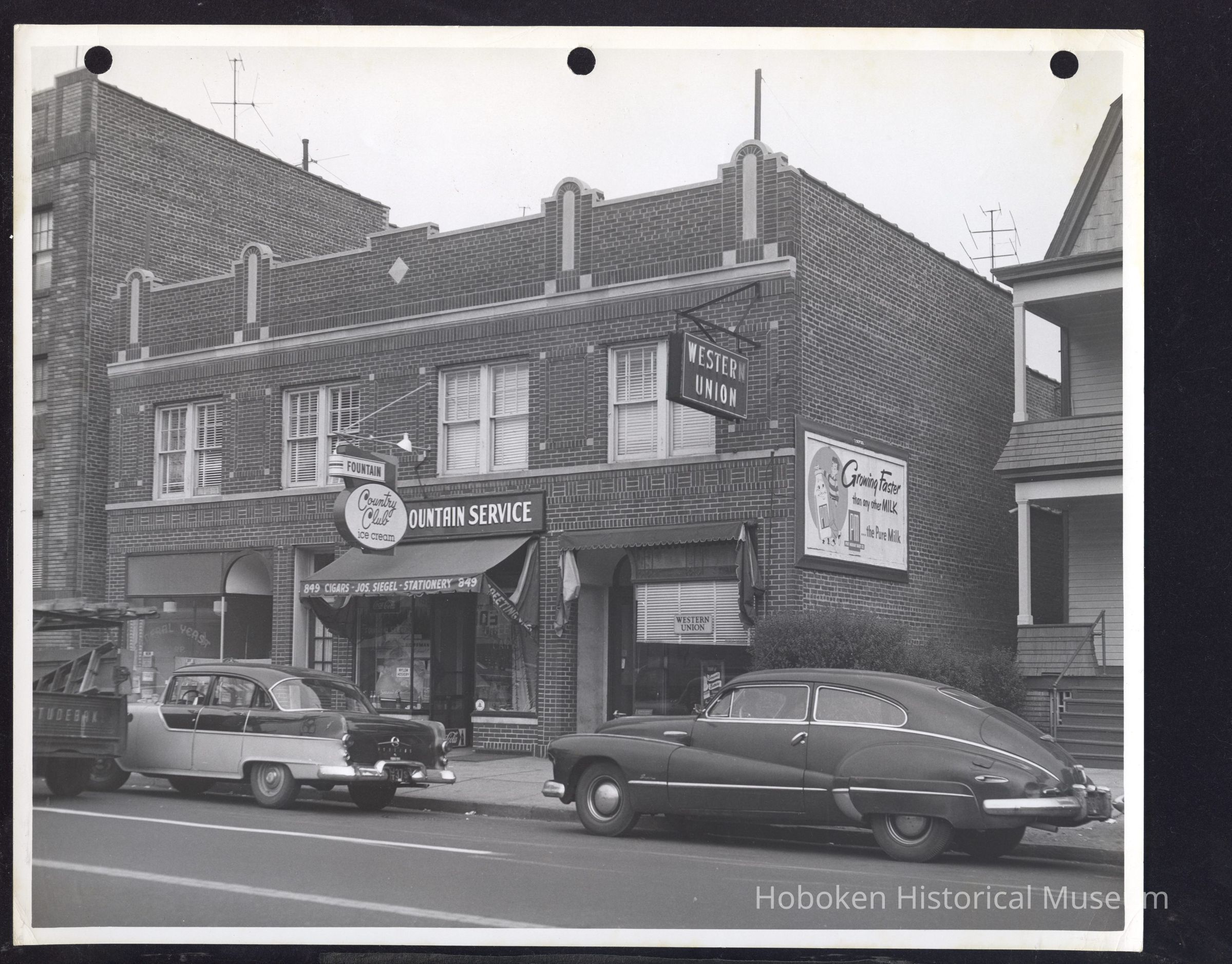 B&W photo of mixed-use apartment building at 849-851 Clinton Avenue, Newark. picture number 1