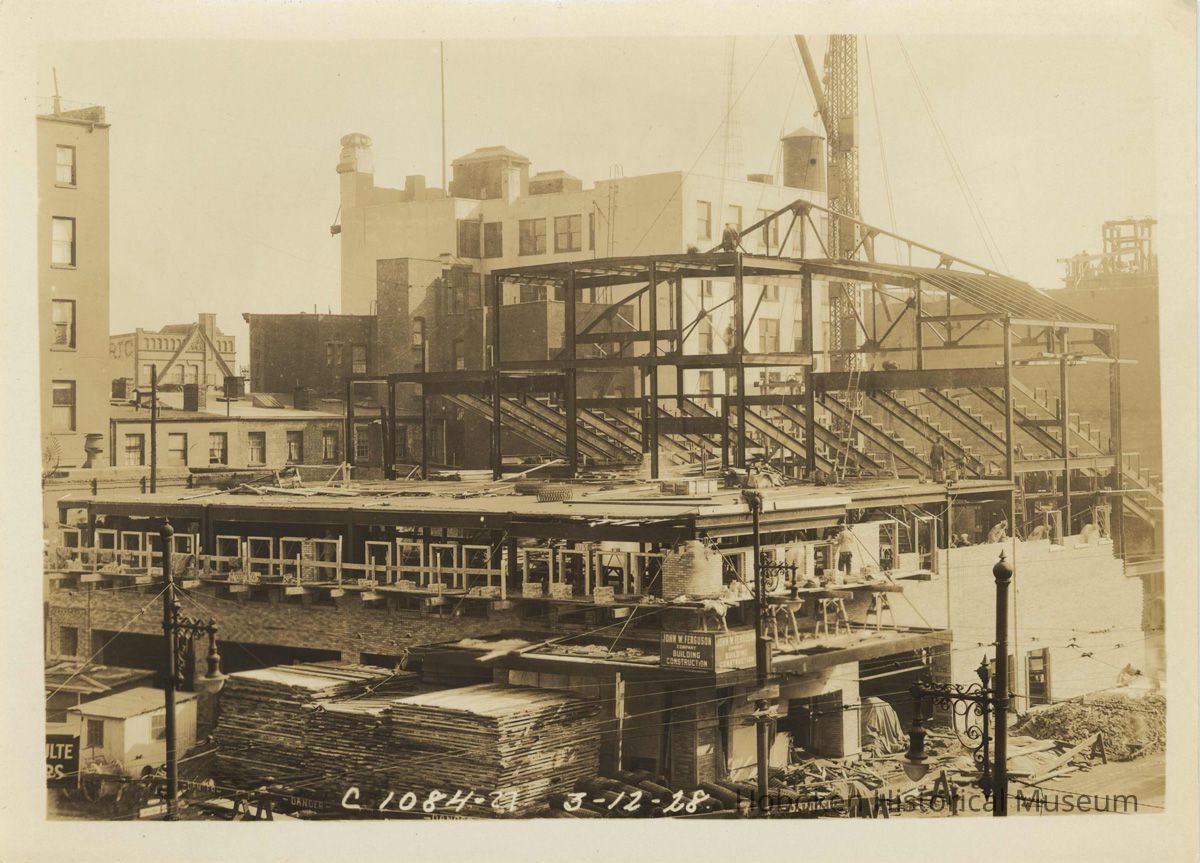 Sepia-tone photo of steel frame erection & Newark St. frontage for the Fabian Theatre, Newark & Washington Sts., Hoboken, March 12, 1928. picture number 1