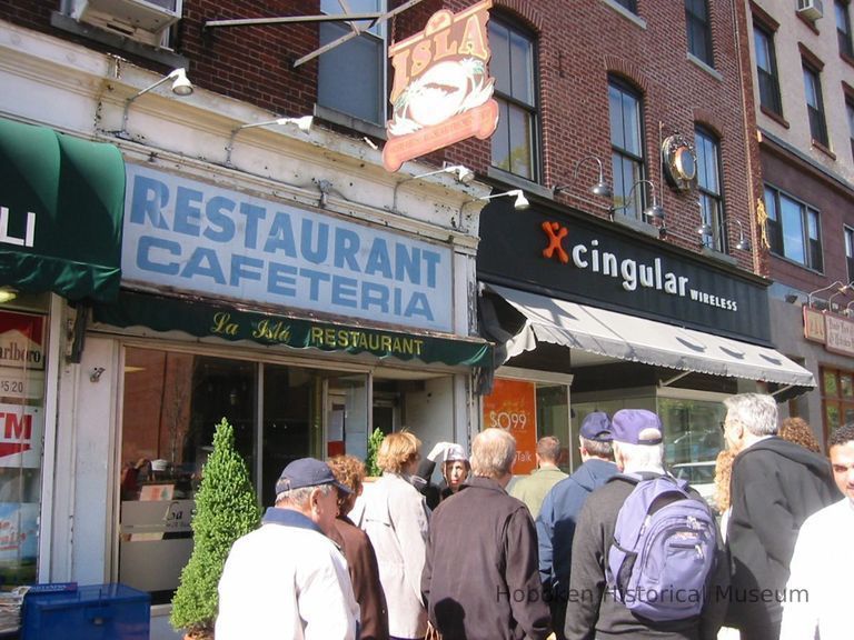 Digital copy of color photo of food tour members outside La Isla Restaurant, 104 Washington St., Hoboken, Oct. 18, 2003. picture number 1