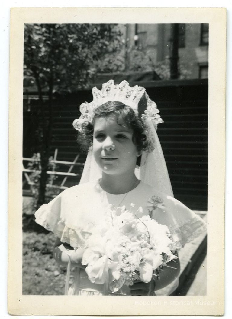 1: Mary Anne Amoroso dressed for Confirmation, 1953