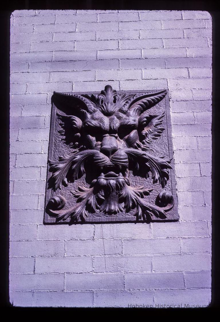 Color slide of close-up view of decorative tile on a building on Garden between 10th and 11th picture number 1