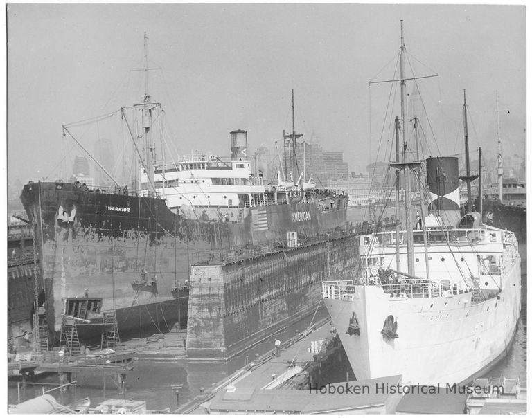 B+W photo of the S.S. Warrior in dry.dock; S.S. Darien in slip south of dry dock, Hoboken, no date, ca. 1940. picture number 1