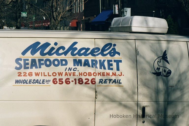 Color photo of a delivery truck sign for Michael's Seafood Market, Inc., 226 Willow Avenue, Hoboken, Jan. 3 & 4, 2002. picture number 1