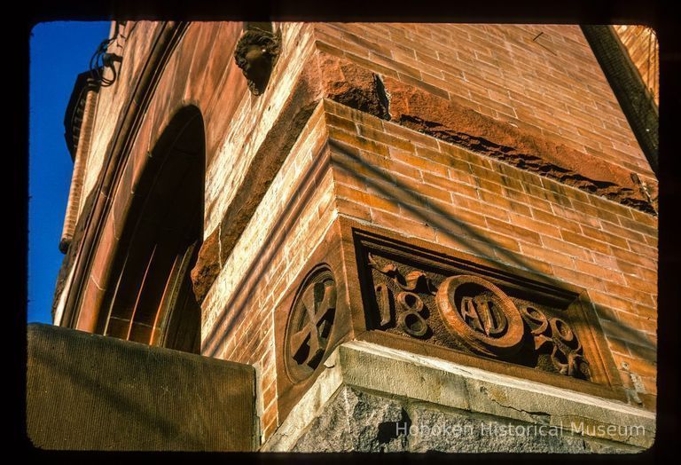 Color slide of close-up view of cornerstone of the First Baptist Church at 901 Bloomfield on the corner of Bloomfield and 9th reading 