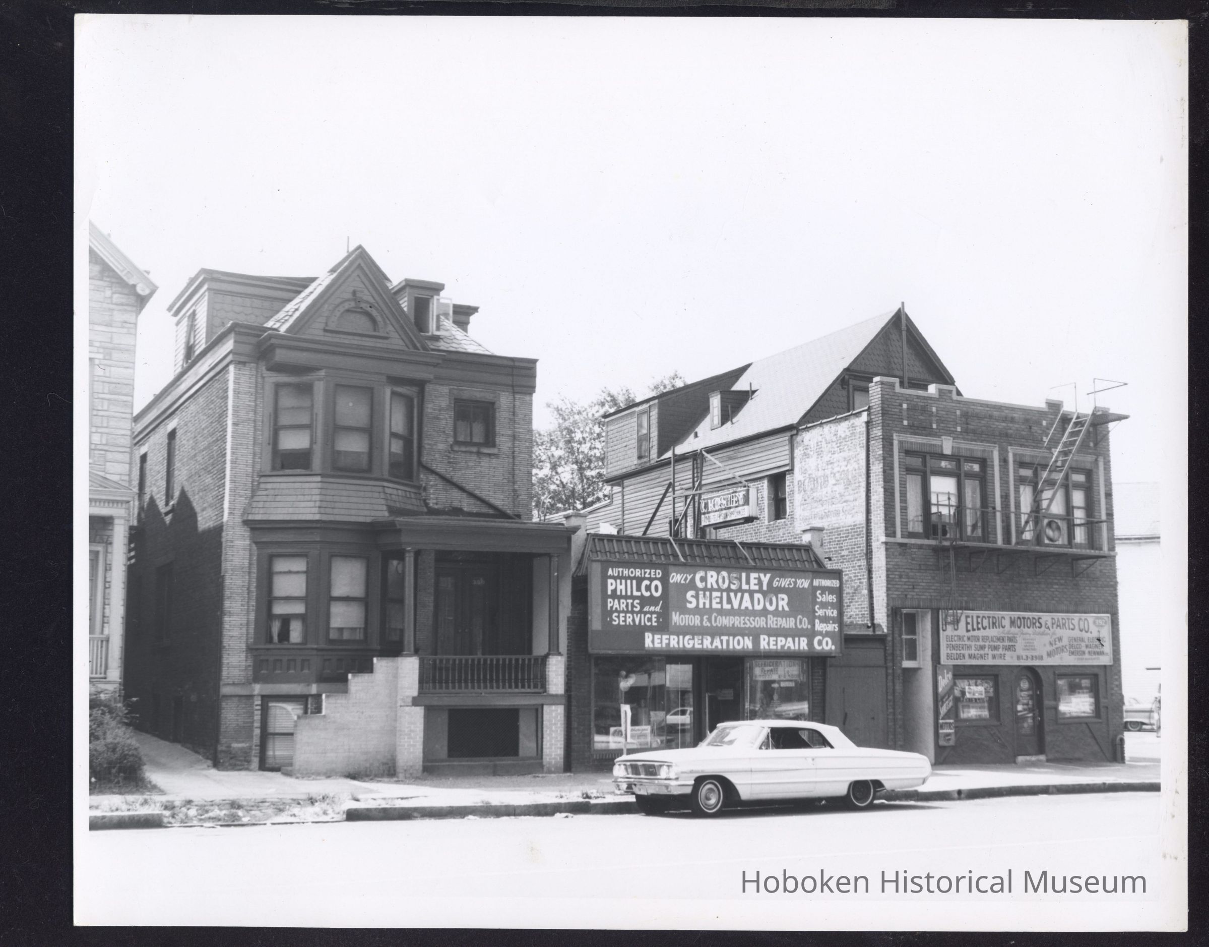 B&W photo of apartment building and commercial buildings at 388-392 Clinton Avenue, Newark. picture number 1