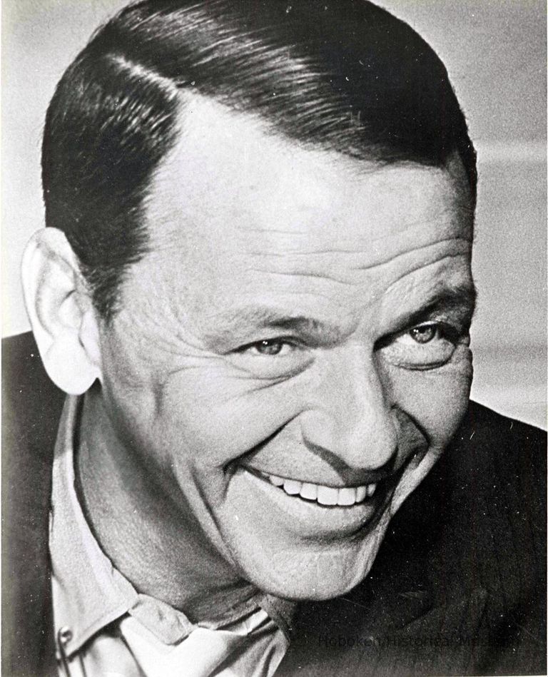 Black-and-white photo of Frank Sinatra in jacket and loose tie, no place, no date, ca. 1970. picture number 1