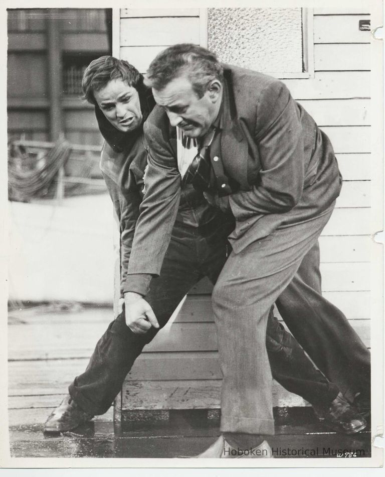 B+W publicity photo of Lee J. Cobb as Johnny Friendly and Marlon Brando as Terry Malloy in film 