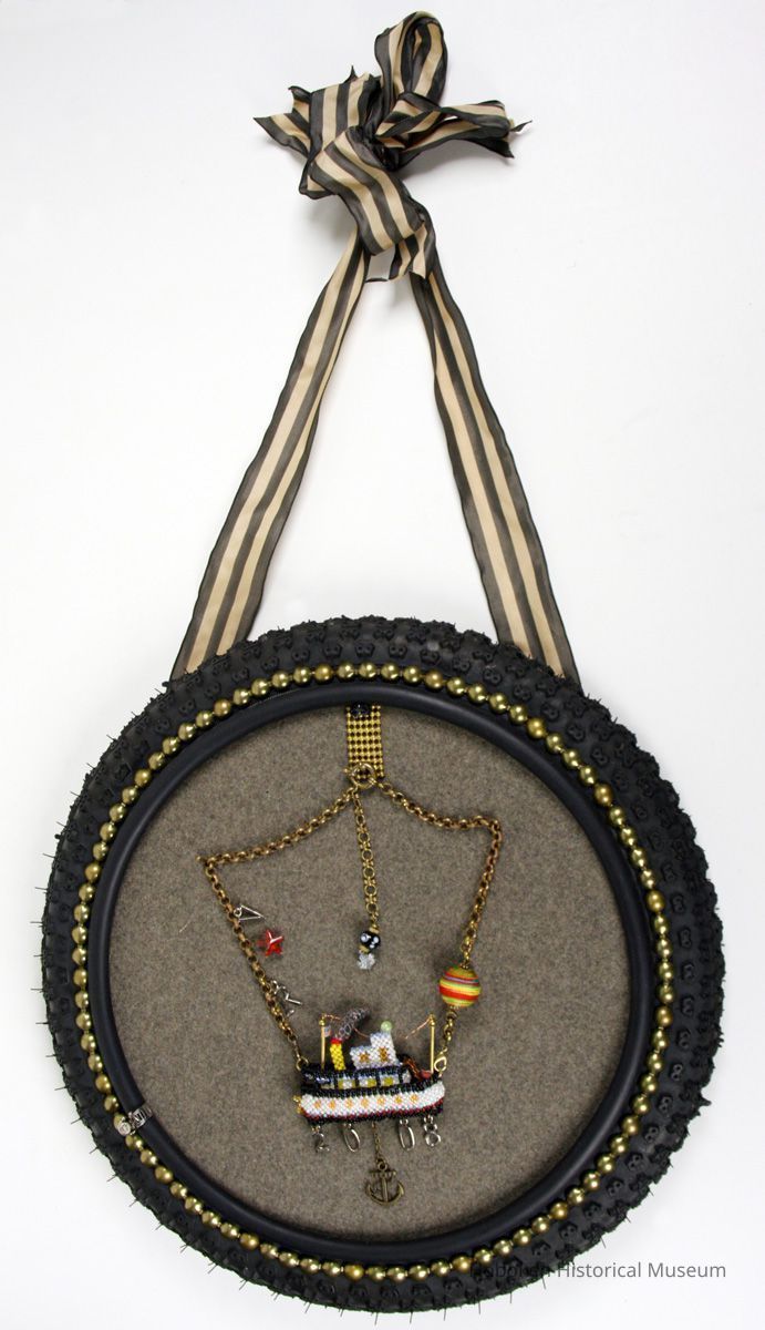 view of entire display piece with jewelry as mounted