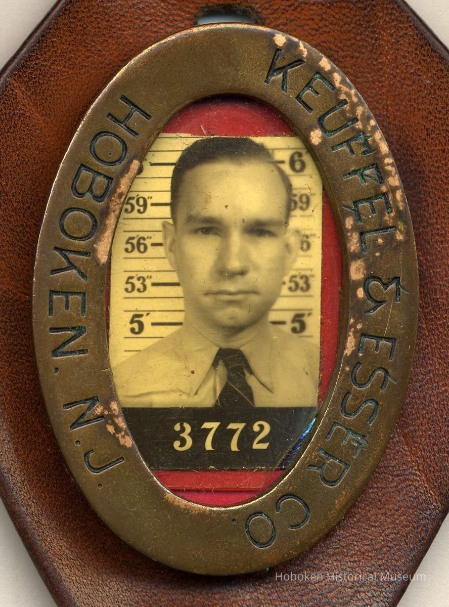 detail of Arthur Miller badge