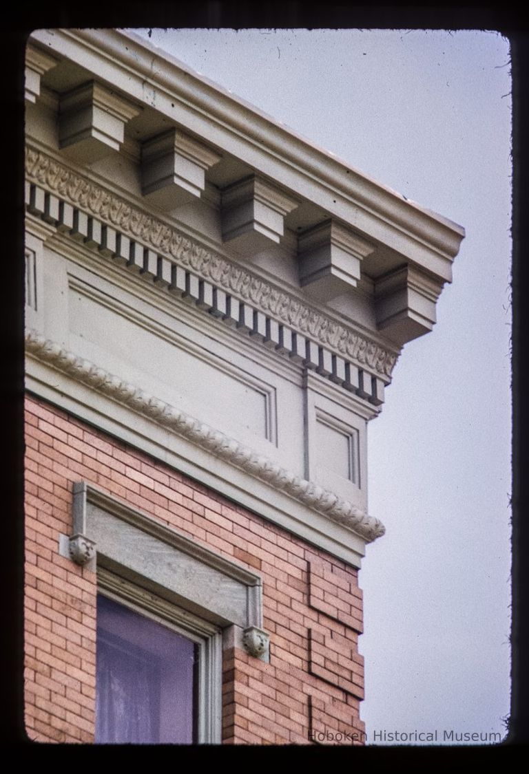 Color slide of detail view of cornice, dentils and brick quoins at 202-204 Hudson between 2nd & 3rd picture number 1