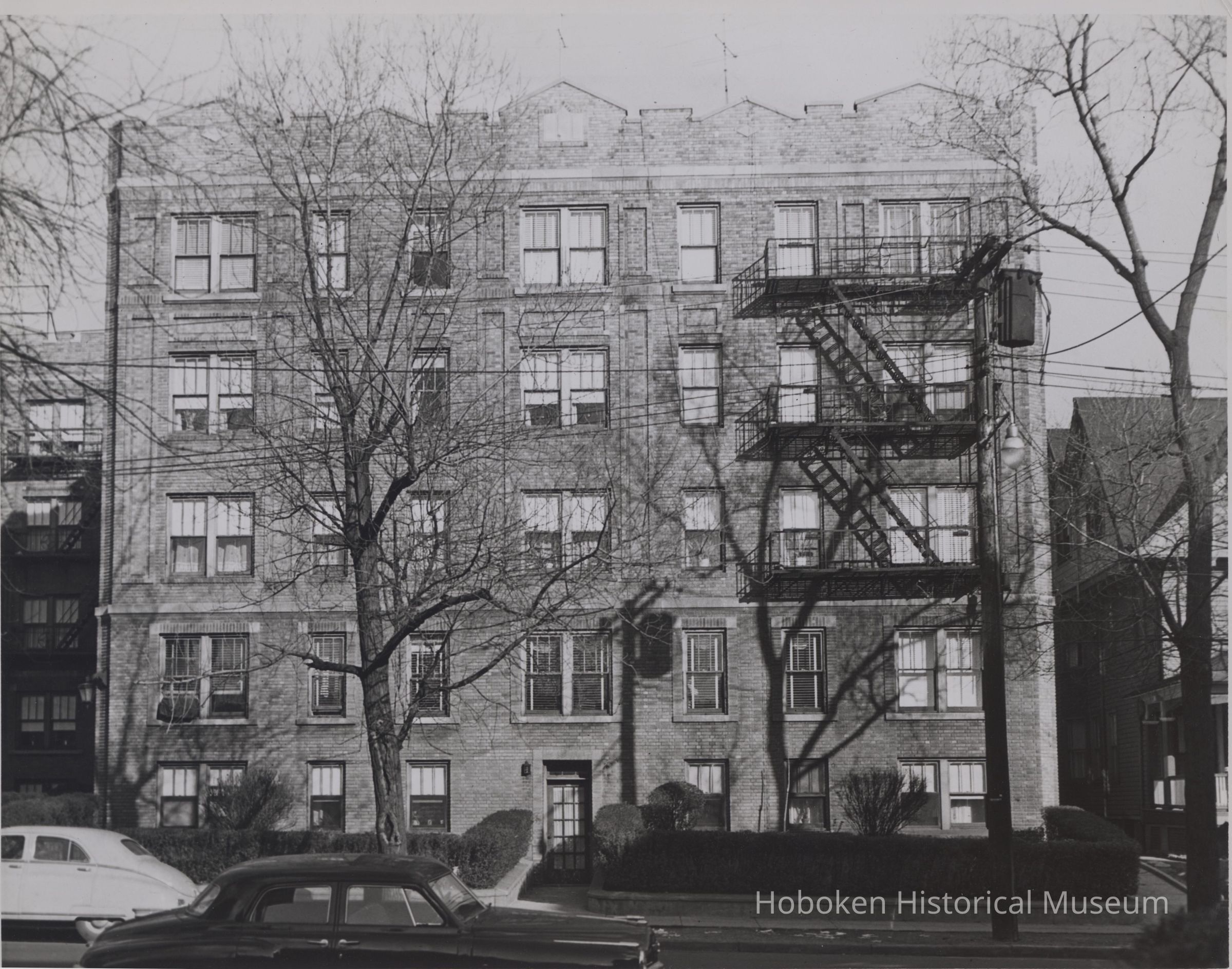 B&W photo of apartment building at unknown location in New Jersey. picture number 1
