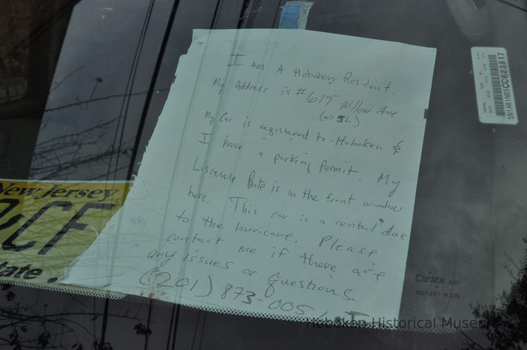 Dsc_0645 note on dashboard of rental car by resident