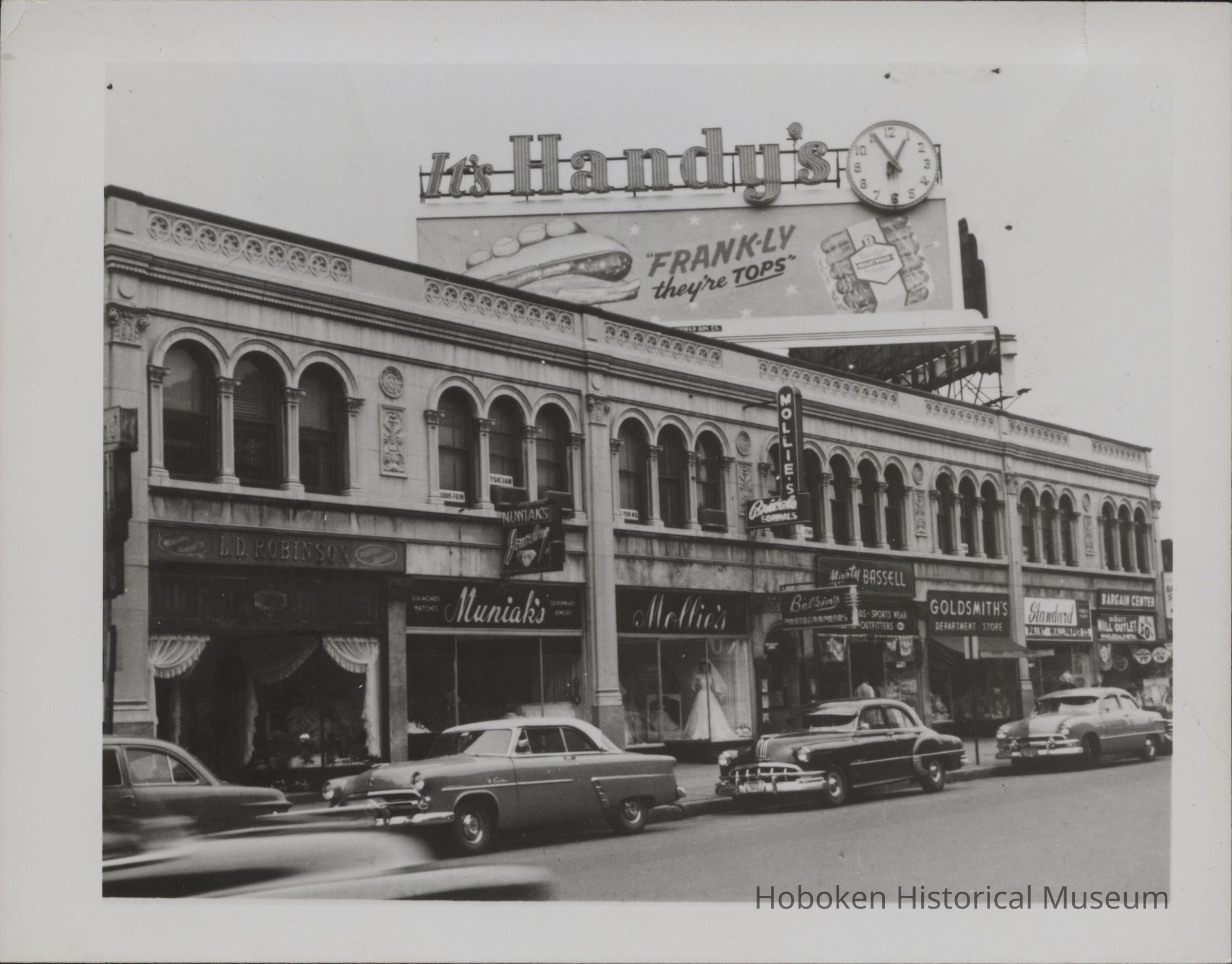 B&W photo of the Goodhue Block of commercial buildings at 1854-1876 Main Street, Springfield, MA. picture number 1