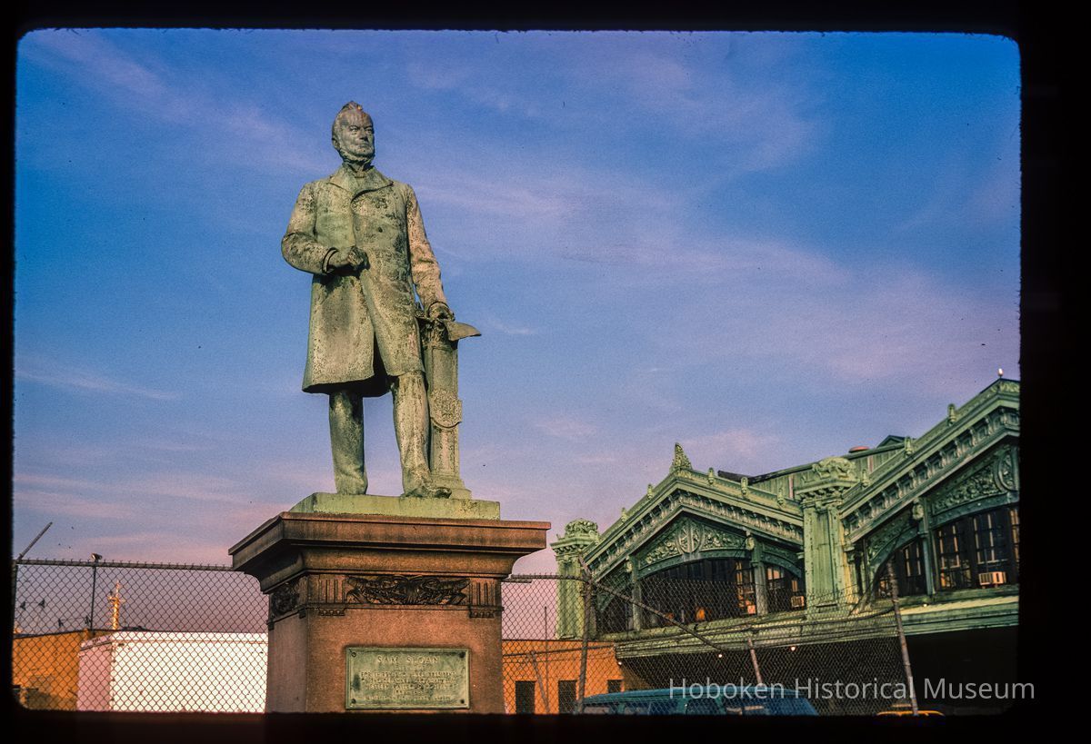 Color slide of eye-level view of the Sam Sloane statue and the Lackawanna Terminal façade picture number 1