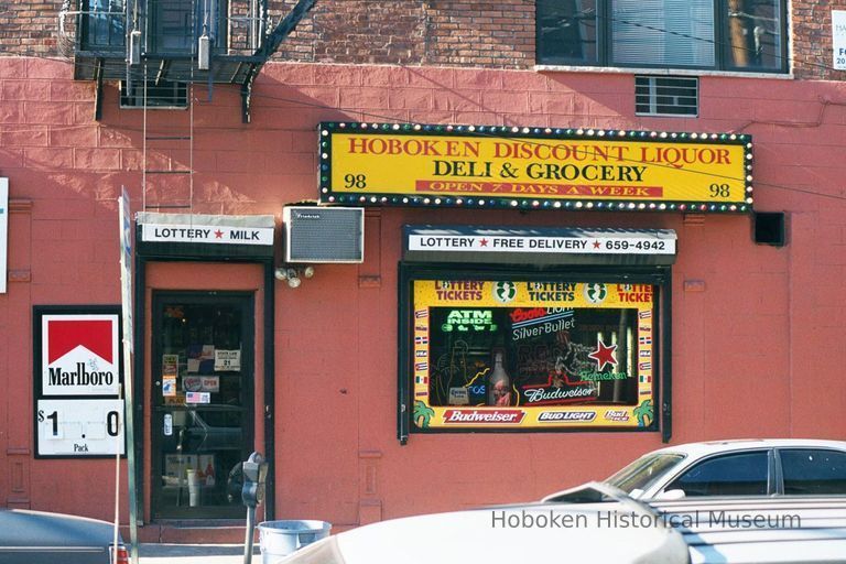 Color photo of a wall sign for Hoboken Discount Liquor, 98 Willow Avenue, Hoboken, Jan. 3 & 4, 2002. picture number 1