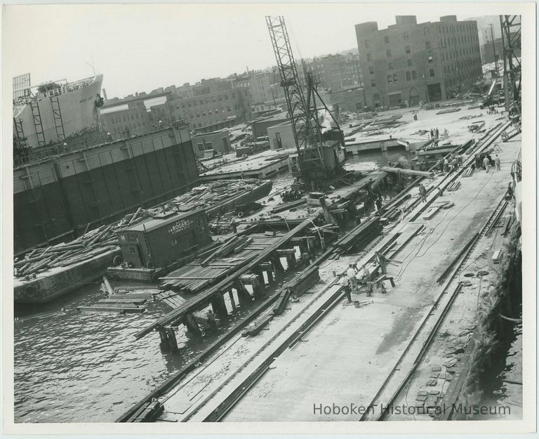 B+W photo of the construction of Pier 5 (formerly Pier 14) at the Bethlehem Steel Shipyard, Hoboken Division, Sept. 18, 1957. picture number 1