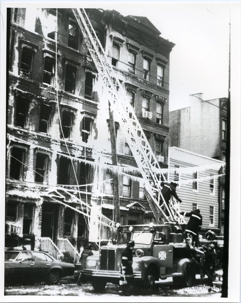 exterior of burned-out tenement building, 121 Clinton St., Jan. 21, 1979