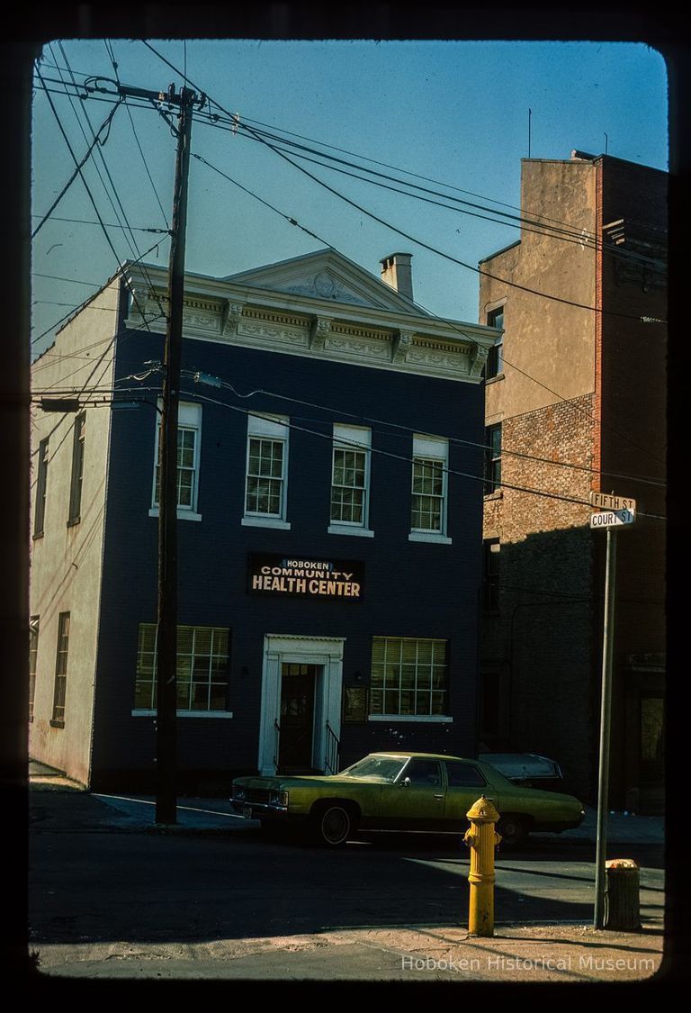 Color slide of eye-level view of the Hoboken Community Health Center building façade at 61 5th on the SW corner of 5th and Court picture number 1